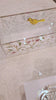 Floral Bird design 9X13 pan holder being open and closed. White acrylic with floral design and gold bird knob on top. Clear acrylic block handles.