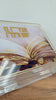 Foldable lucite tabletop Shtender with painted sefer design, featuring the words Vehagisa Bo Yomam V'layla. Soft gold accents on top. Video showing the foldable mechanism and putting a sefer on the shtender.