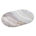 Agate Hadlokas Neiros Set with gray and white marbled stone oval tray and brass accents for candle lighting.