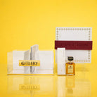 Bencher set silverware caddy with clear acrylic cutlery holder and elegant bencher display, styled as a Mishloach Manos gift against a yellow background.