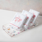 Butterfly Towel Set bundle by Waterdale Collection with white towels featuring pink butterfly prints displayed in clear acrylic organizer