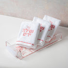 Cherry Blossom Towel Set by Waterdale Collection displayed in clear acrylic organizer with pink floral branding on white towel packaging.