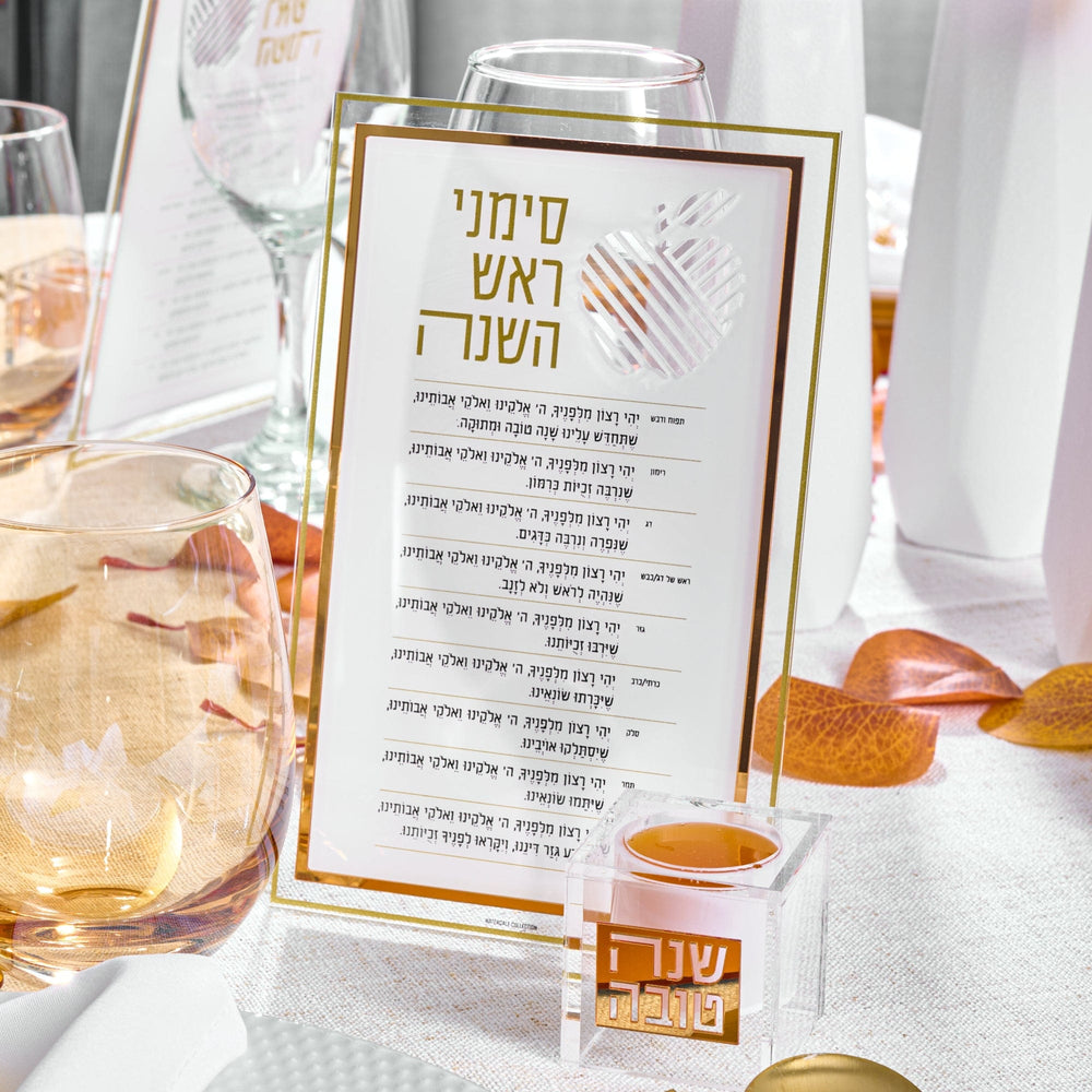 Personal Suspended Honey Dishes beside Rosh Hashanah Simanim menu card displayed prominently on a festive dining table
