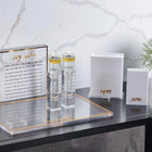 Classic Hadlokas Neiros Set by Waterdale Collection displayed on black shelf with glass bottles and white box packaging