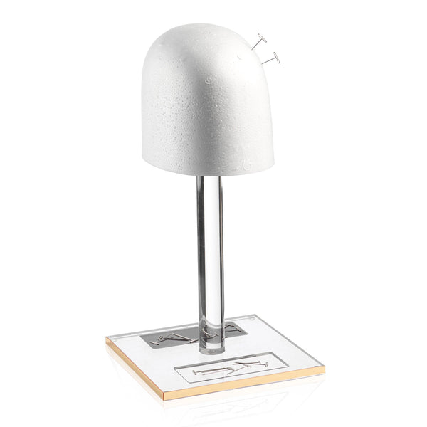 Waterdale collection - White wig head with a metallic base on a white background