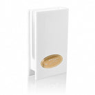 White Lucite matchbox holder from Waterdale Collection with a gold oval Shabbos plaque, shown upright