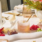 Classic round resin honey dish styled on a Jewish New Year table