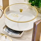 Classic Script bencher set matzah box in white and clear acrylic with gold trim and monogram detail, featuring a matching lid and built-in drawer for benchers, styled on an elegant Passover