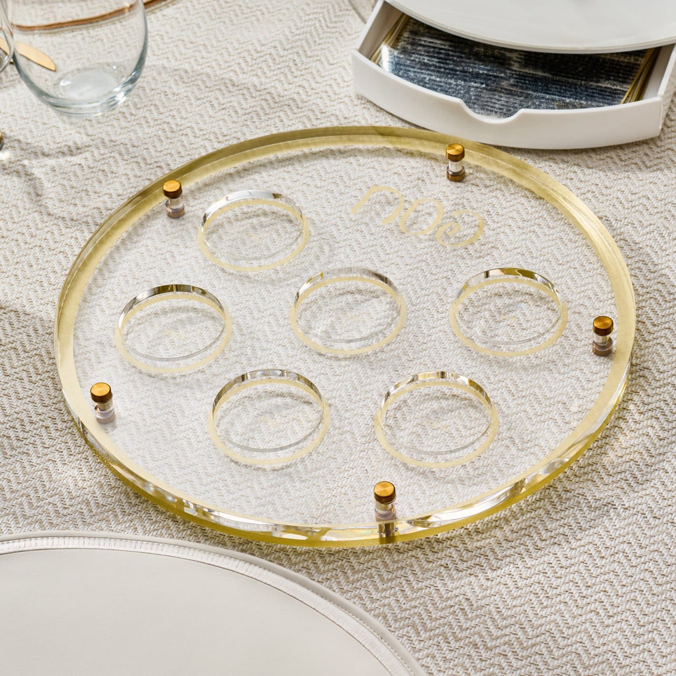 Classic Script Seder Plate with a clear lucite base, gold mirror accents, and six ritual food bowls for Passover.