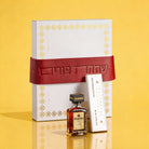 Elegant Mishloach Manot gift basket for Purim featuring premium wine, Hebrew-themed Judaica, and deluxe gift boxes