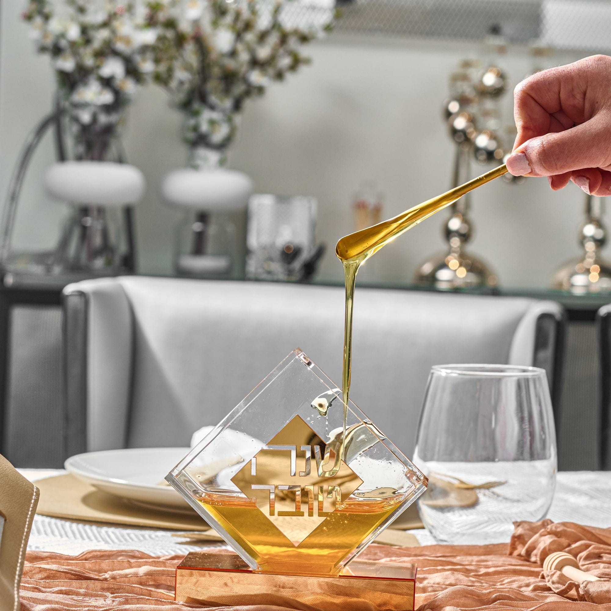 Diamond Honey Dish with honey and finger holding a small spoon
