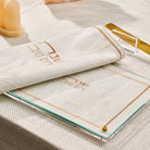 Leather and Lucite challah board and cover on a set shabbos table from waterdale collection