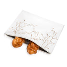 Waterdale Collection embroidered leaf challah board with matching pouch set, featuring white linen fabric with delicate botanical design and two braided rolls.