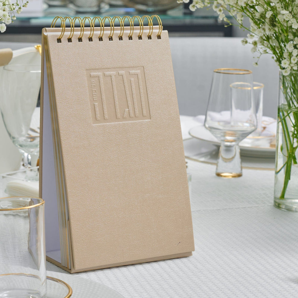Extra Large Standing Leather Painted Haggadah on a table.