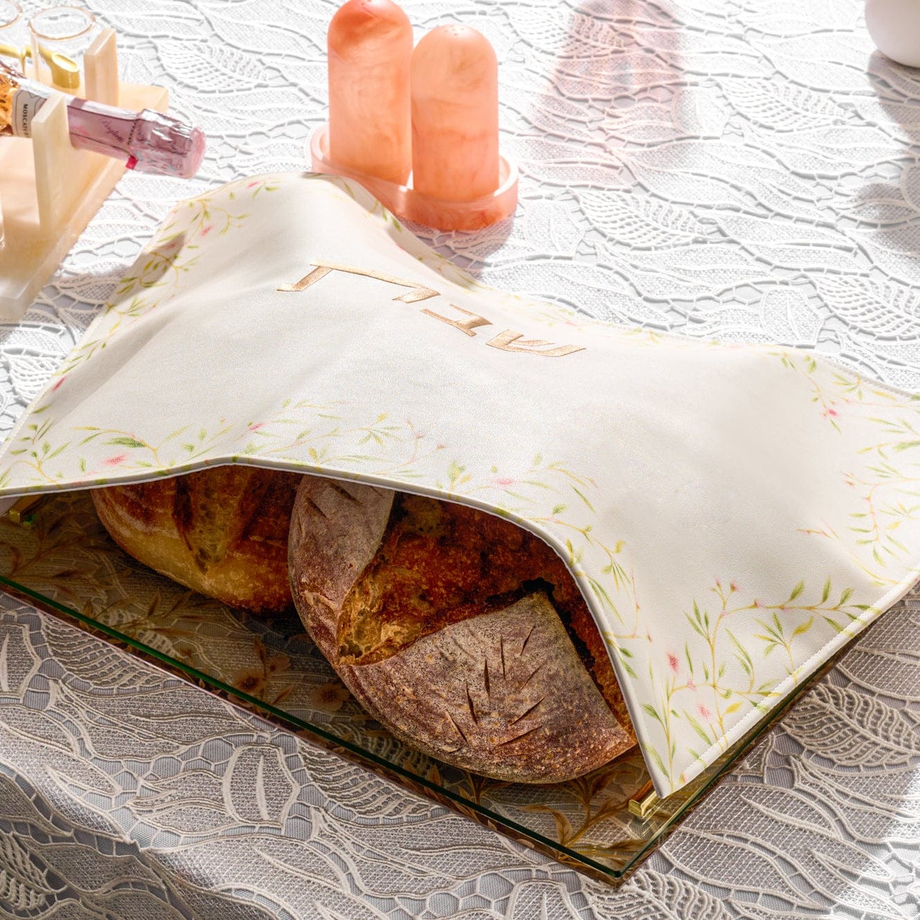 Waterdale Collection Pink Floral Bird Challah Cover in soft cream fabric with delicate pink and green floral border and gold “Shabbat” embroidery, elegant Shabbos table décor, luxury Judaica challah cover for Jewish home or wedding gift