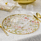 Floral Bird charger with an intricate cherry blossom design and gold-rimmed edge for elegant table settings.