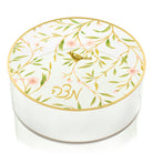 Modern round lucite Matzah holder for Pesach with a luxury spring floral motif, gold accents, and a secure lid — Waterdale Collection.