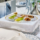 Frame Seder Plate in white marble acrylic with gold rim, modern Passover Pesach plate with Hebrew labels and traditional Seder foods, luxury Judaica holiday table centerpiece.