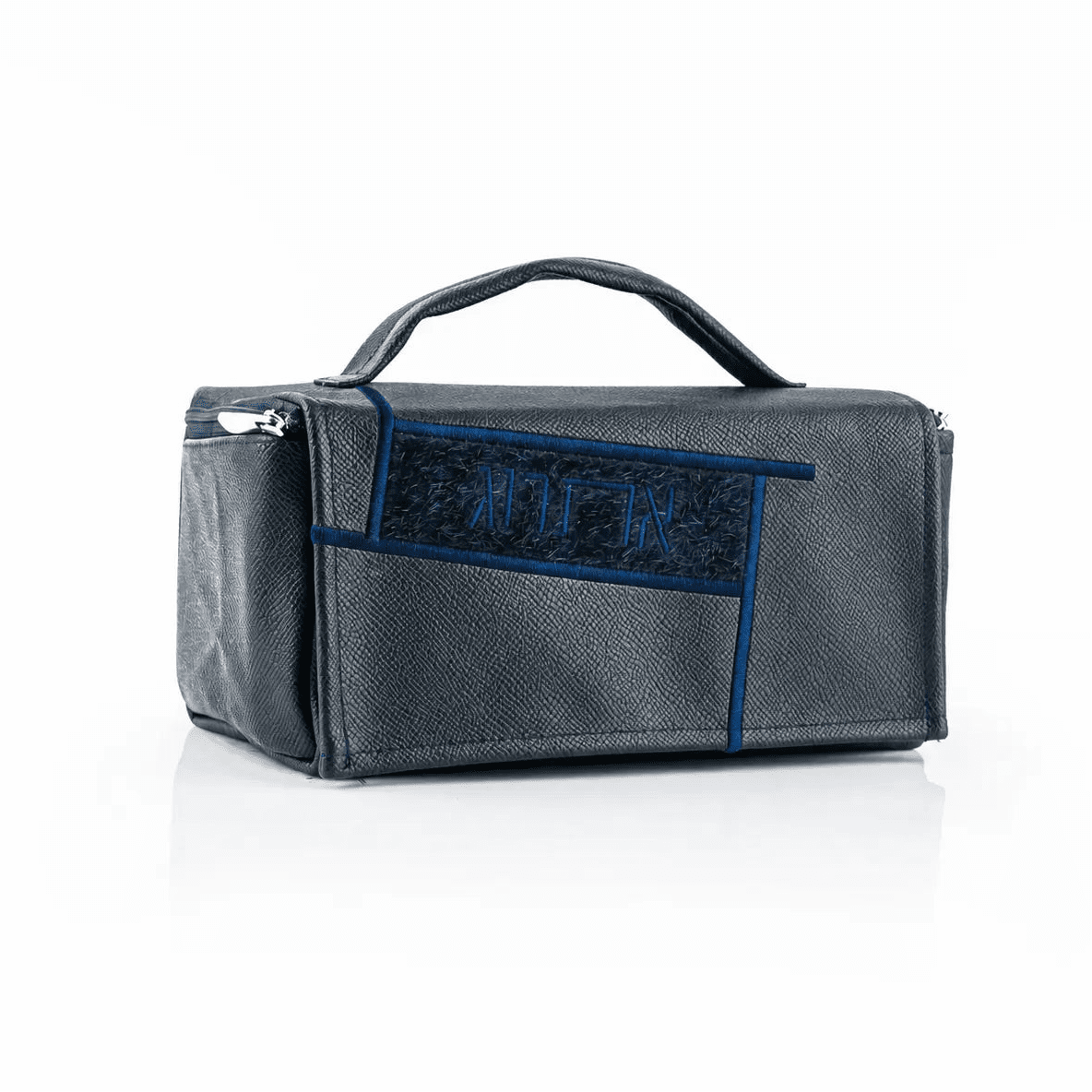 Navy Sukkot etrog case in textured vegan leather with navy fur panel, top handle and zipper.