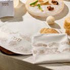 Inlay Floral Pesach Set featuring embroidered matzah cover and afikoman bag in elegant cream with gold floral detailing, luxury Passover table décor set, traditional Judaica gift for Seder night