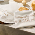 Inlay Floral Pesach Set with embroidered cream matzah cover and matching afikoman bag, elegant gold floral design, luxury Passover Seder table décor, traditional Judaica Pesach gift set
