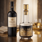 Luxury Jewish art wine decanter with a gold and silver Kosel at Winter design and matching gold top — Waterdale Collection.