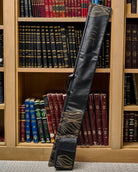 Lace Lulav and Esrog Case displayed in front of a wooden bookcase.