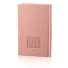 mauve pink tehillim with embossed logo on a white background