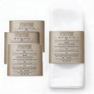 Modern leatherette Passover napkin rings with gold metallic trim and removable Seder ritual cards for luxury holiday table settings — Waterdale Collection.