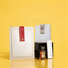 Leather set pouch Mishloach Manos gift with premium leather pouches and packaged liqueur.