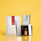 Leather set pouch Mishloach Manos gift featuring white and gray leather pouches with premium liqueur.