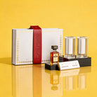 Elegant Mishloach Manot gift basket for Purim featuring premium wine, Hebrew-themed Judaica, and deluxe gift boxes