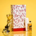 Waterdale Collection Purim Mishloach Manos drawer box with Spiral Havdalah candle, chocolate, and Black Label whiskey