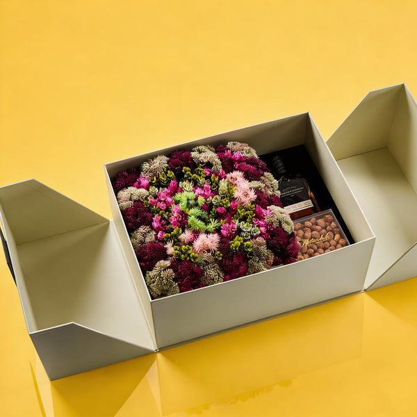 Luxury Mishloach Manot corporate Purim gift box with premium wine and Judaica items in elegant packaging - Waterdale Collection