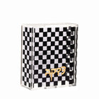 Onyx Hadlokas Neiros Set with black and white checkered pattern design and gold accents on acrylic display box.