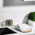 Onyx Netilas Yadayim Set displayed on white countertop with checkered cup and stacked books, modern home décor styling.
