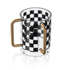 Onyx Netilas Yadayim Set with black and white checkered glass pitcher and matching cup with bronze handles.