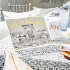 Painted Bais Hamikdash Haggadah stand featuring a painted illustration of the Holy Temple (Bais Hamikdash) in neutral taupe and gold tones.