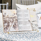 Artistic Jerusalem-themed Haggadah stand, luxury taupe and gold Passover table accessory for hands-free reading.