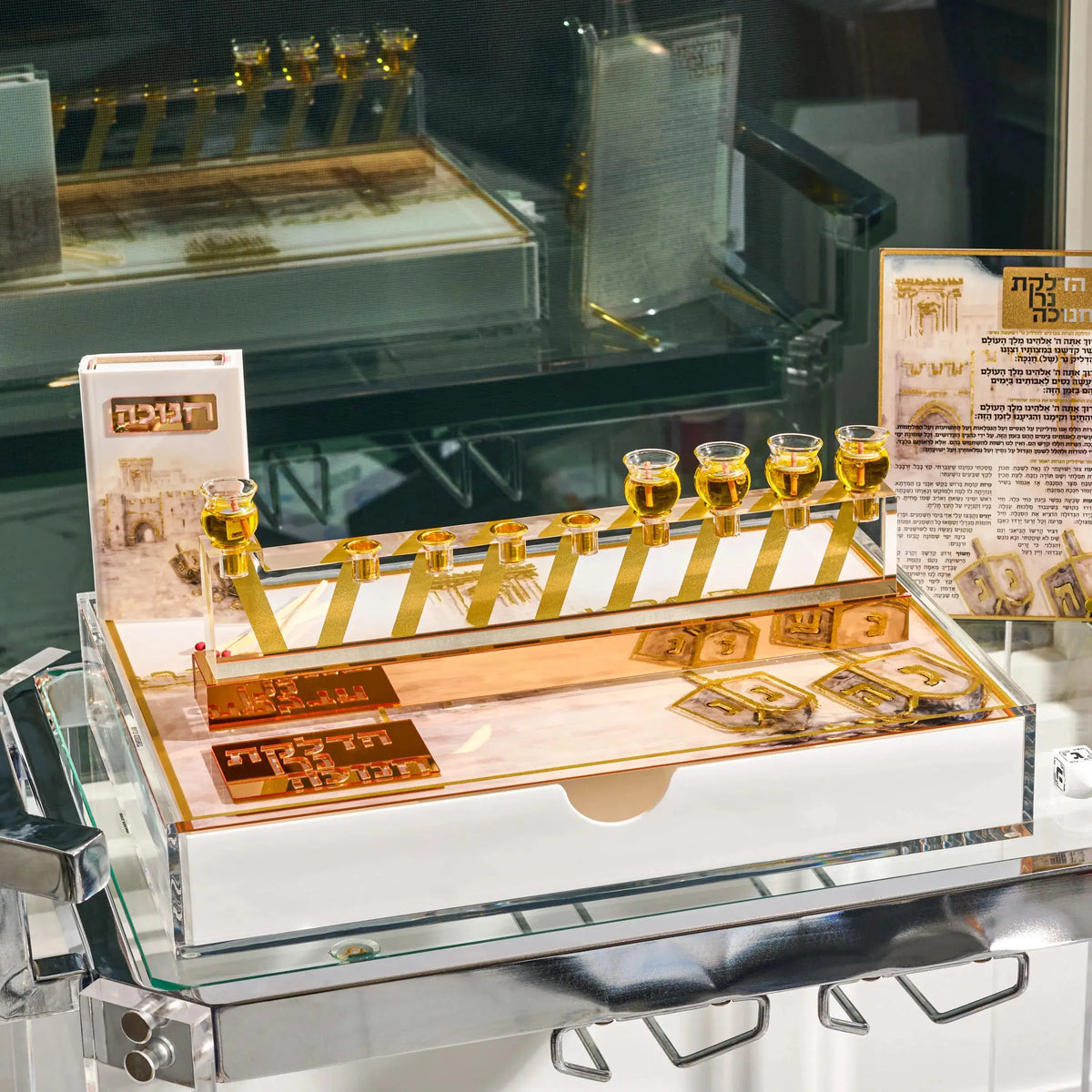 Jerusalem Painted Dreidel Chanuka Set by Waterdale Collection: Lucite menorah tray, match box, and Chanukah brachos tabletop with a gold menorah