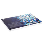 Painted Mosaic Chanukah Set by Waterdale Collection featuring blue and white ceramic pieces arranged on dark packaging.
