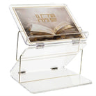 Clear acrylic shtender with gold accents featuring an open book design on a white background - waterdale collection