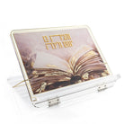 Lucite tabletop foldable shtender with painted sefer design that says Vehagisa Bo Yomam V'layla with gold accents on it.