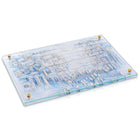 Painted Yosefa challah board and cover set with blue Kosel painting design on white ceramic base with handles.