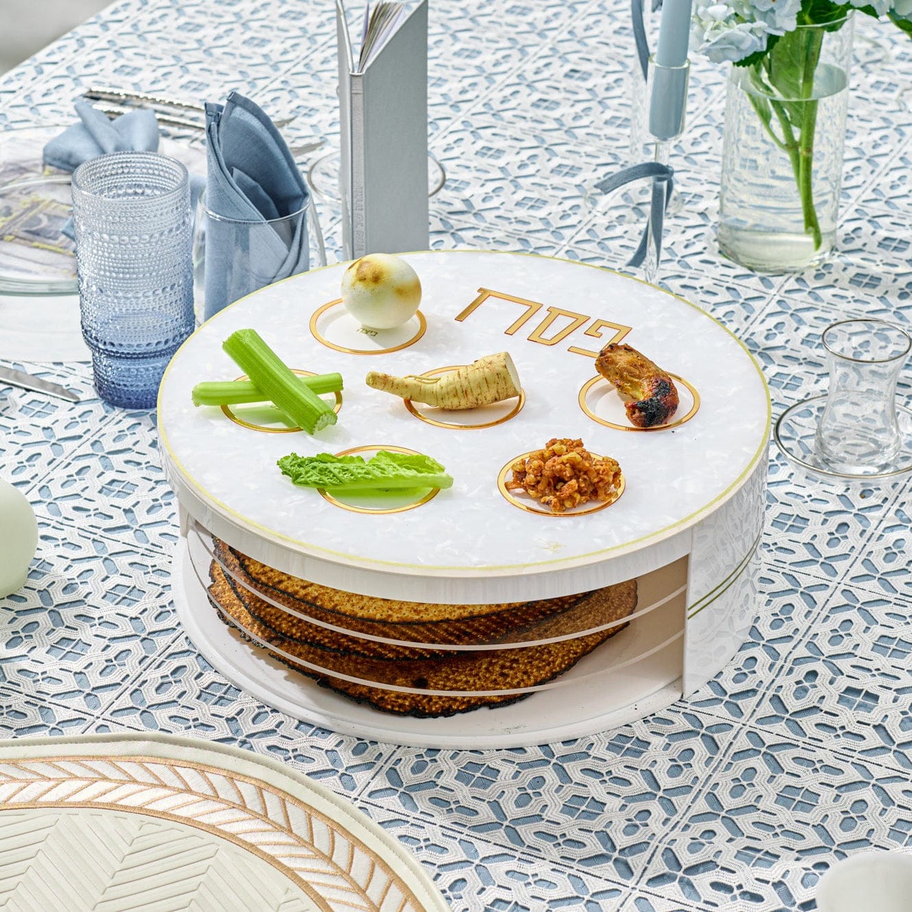 Pearlstone 3 Level Spinning Seder Plate with white and gold design, rotating Passover Seder plate with Hebrew Pesach labels and matzah storage, luxury Judaica Pesach table centerpiece for holiday entertaining.