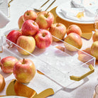 Fresh apples are displayed in a Pearlstone Bread / Towel Tray on an elegant table setting.