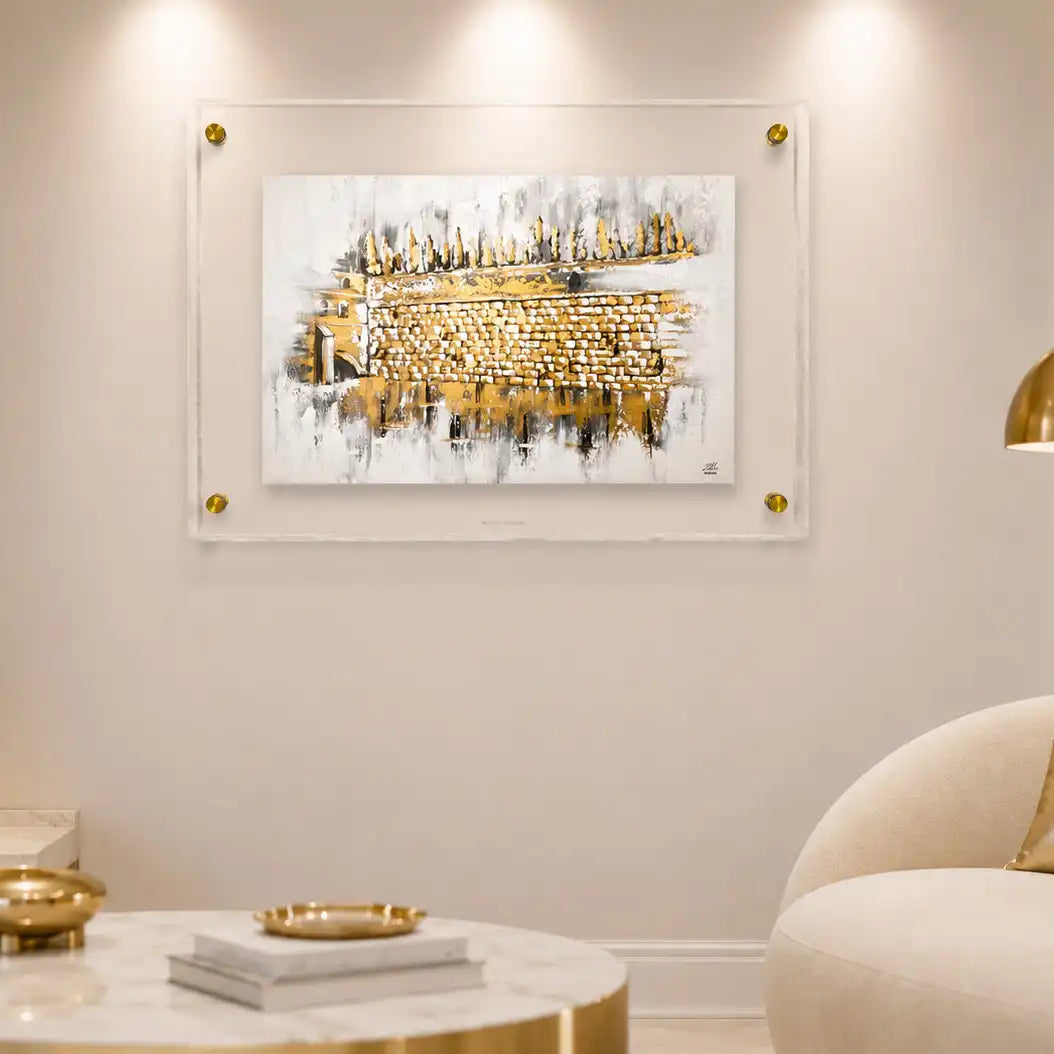 Pearlstone frame around a clear lucite middle that has the kosel at winter painting in the middle.