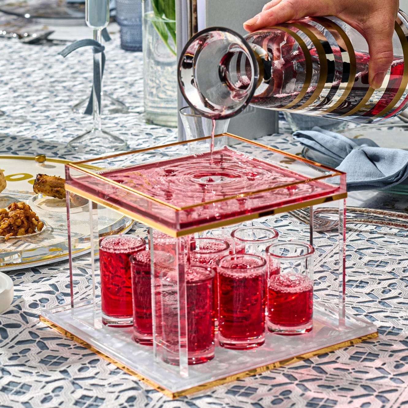 Pearlstone Kiddush Fountain, elegant acrylic Shabbos wine fountain with gold trim, modern Judaica centerpiece for Kiddush, includes multiple matching cups for family and guests, perfect for Shabbat and Yom Tov table décor.