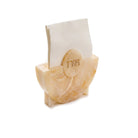 Pesach resin napkin holder in marbled cream finish with round gold Hebrew “Pesach” emblem, holding white napkins for Seder table décor.