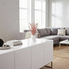 Blush pink circular hollow vase with artificial flowers, elegant centerpiece for Purim Mishloach Manos, spring tablescapes, or luxury hostess gifts.